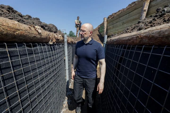 Shmyhal inspects construction of fortifications in Kharkiv region