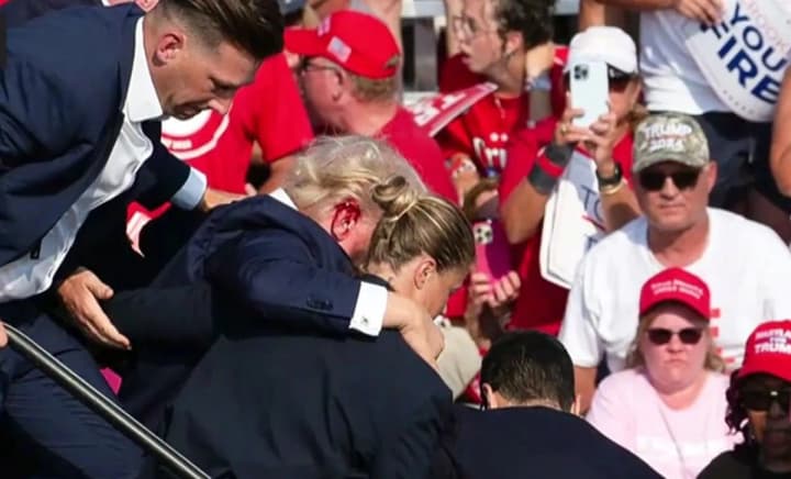 Police officer confronted armed man before he shot Trump - Associated Press