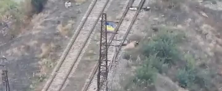 Flag of Ukraine flies over Kurdyumivka in Donetsk region