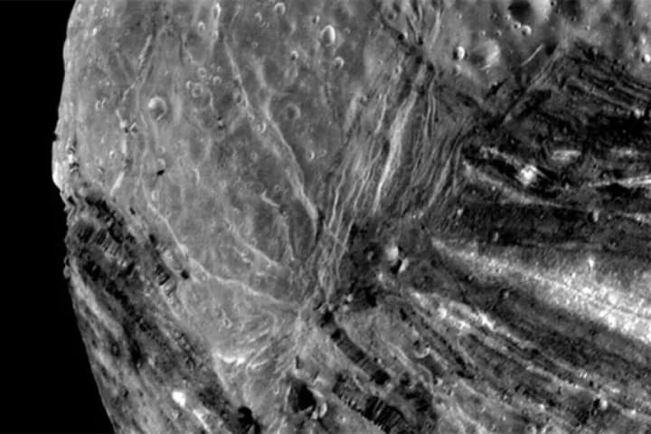 One of Uranus's moons may be hiding a huge underground ocean of liquid water