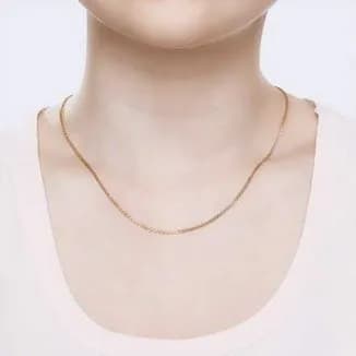 Gold chain-a jewelry addition to a feminine look