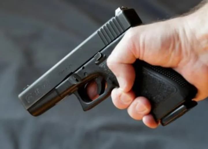 Man opens fire at ex-girlfriend's workplace