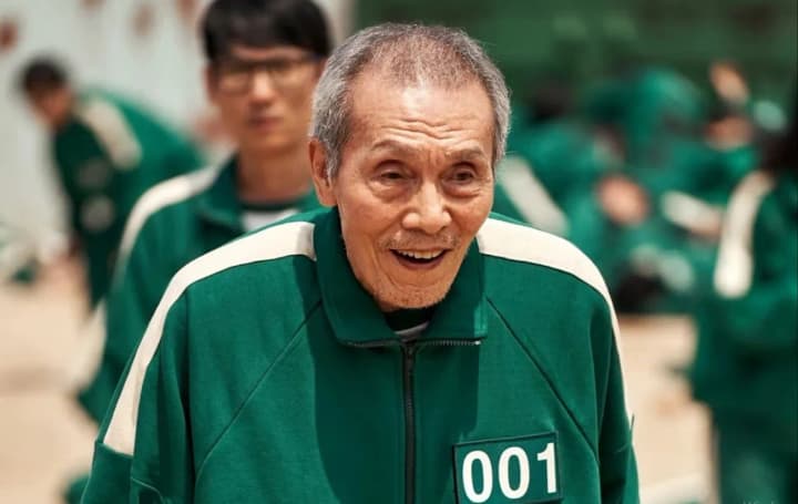 The 80-year-old star of "Squid Game" was sentenced to a year in prison for violent corruption of his filming partner