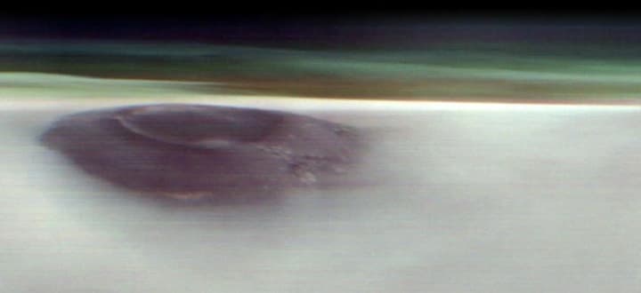 The Martian apparatus captured a unique image of a volcano piercing through the clouds