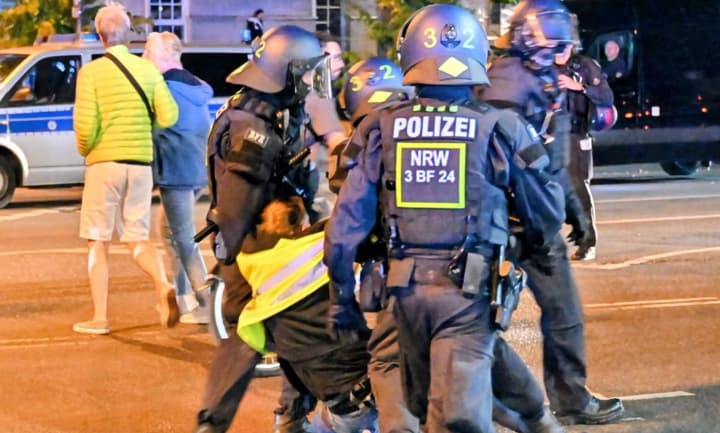 In Germany, an "anti-war" march escalated into armed violence