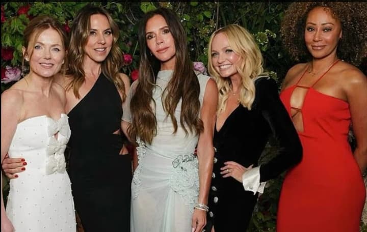 Victoria Beckham hints at Spice Girls reunion at Oasis concert - Daily Mail