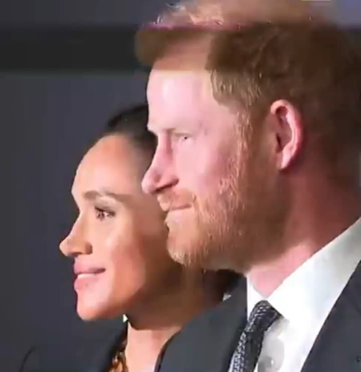 Meghan Markle in a black suit impressed with a rare red carpet appearance with Prince Harry