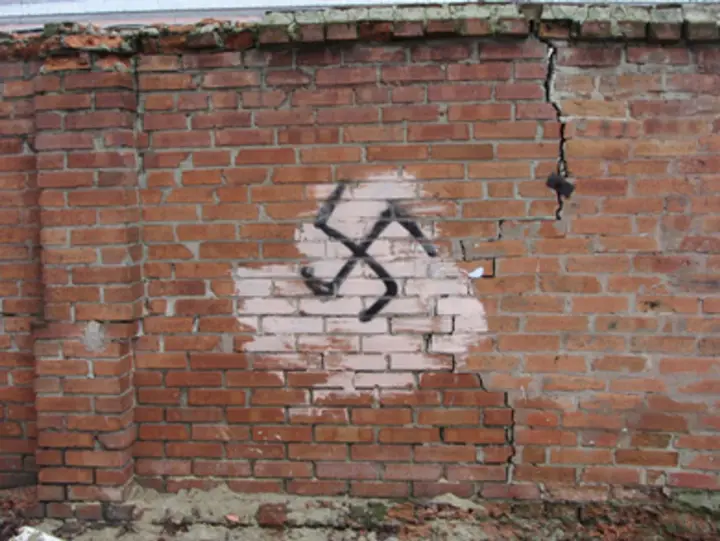 In Germany, teenagers drew swastikas on Jewish gravestones