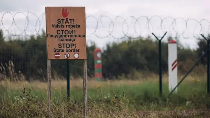 Armed masked men attempted to enter Latvian territory and threatened military personnel