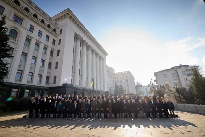 zelenskyy-posted-a-photo-of-the-team-outside-the-parliament-two-years-we-are-all-here
