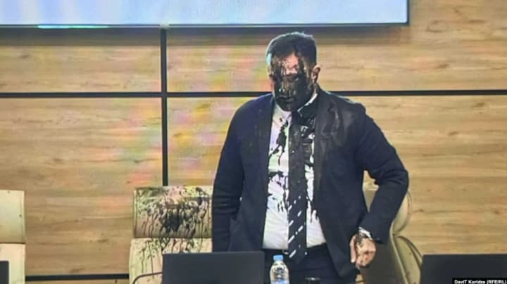 georgian-cec-head-doused-with-black-paint-while-approving-election-results