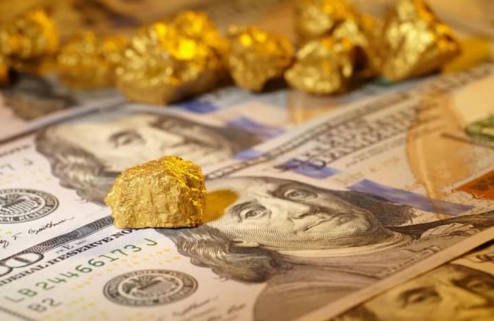 gold-is-getting-more-expensive-the-dollar-is-weakening-investors-are-waiting-for-us-china-talks-and-the-feds-decision