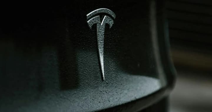 tesla-car-sales-in-germany-halved-reuters