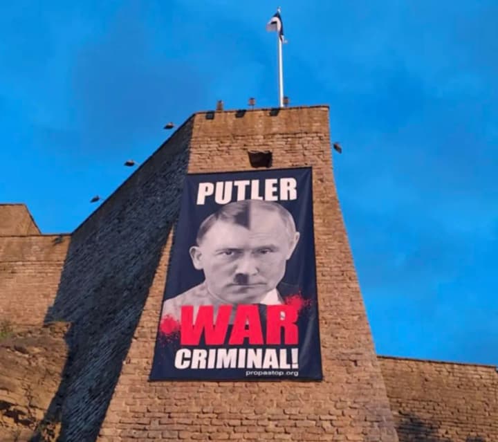 in-narva-on-the-border-with-russia-a-poster-with-putin-in-the-image-of-hitler-was-hung