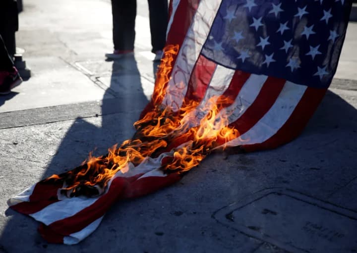 us-president-signed-a-decree-on-criminal-prosecution-for-desecration-of-the-state-flag