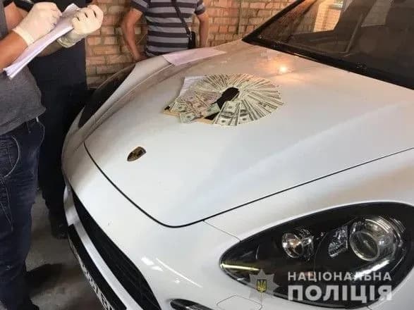 Обшуки у банди "Біле братство": поліція вилучила зброю, наркотики та Porshe