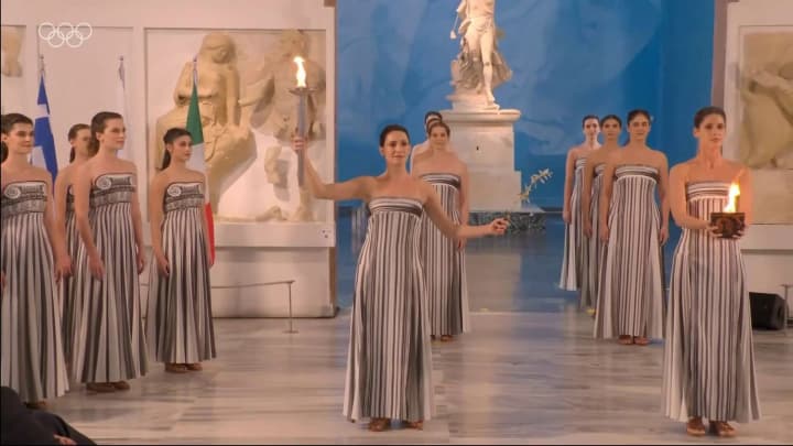 Мілан-Кортіна-2026: урочисто запалили Олімпійський вогонь