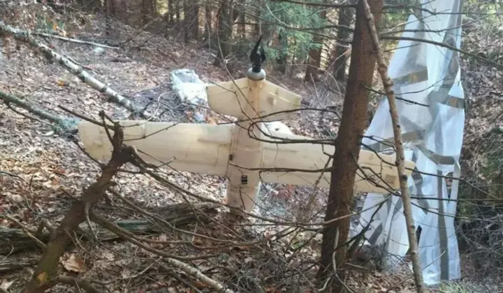 Unknown drone with a parachute found in a forest in Romania