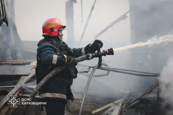 Russian strike drone attacked a civilian enterprise in Kharkiv: trucks caught fire, a woman and a child were injured