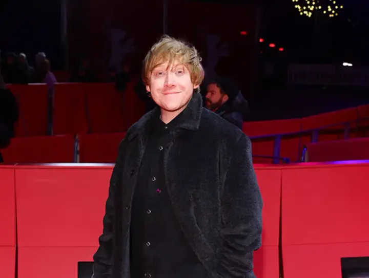 Rupert Grint will return to the role of Ron Weasley in "Harry Potter," but not on screen