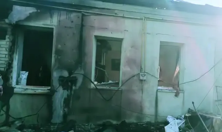 A strike on a grocery store near Kharkiv claimed the lives of 3 people; a child is among the 7 wounded