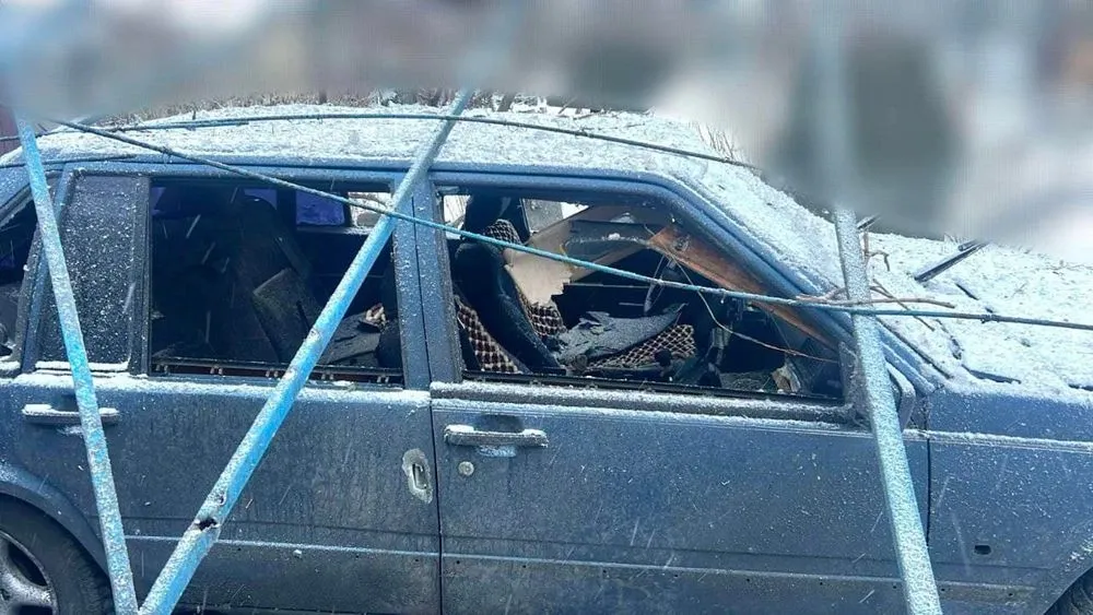 A car damaged by missile fragments, Kyiv region, 8 December 2023: Kyiv regional police.
