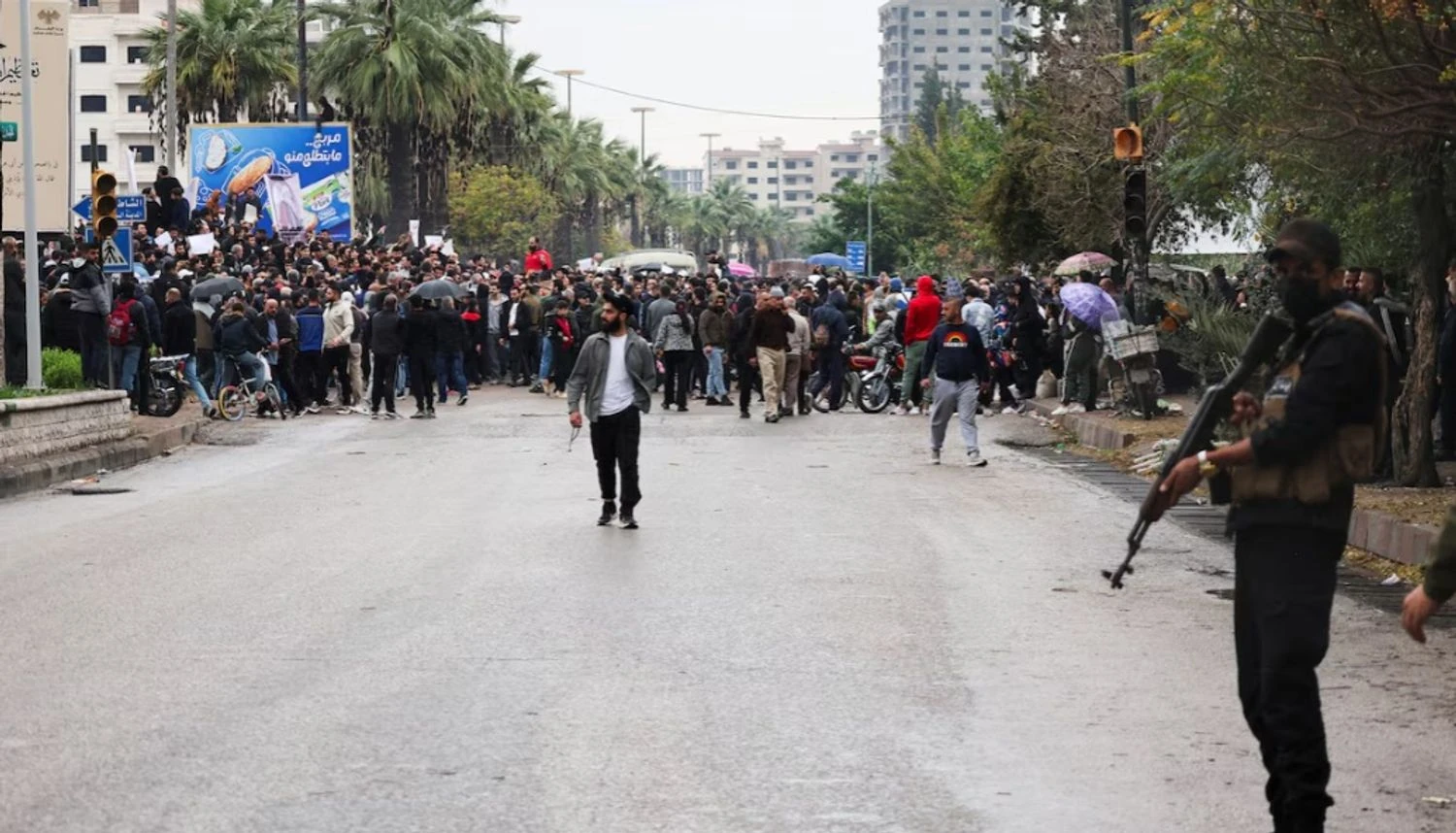 In Syria's Latakia, security forces opened fire to disperse clashes between groups of demonstrators