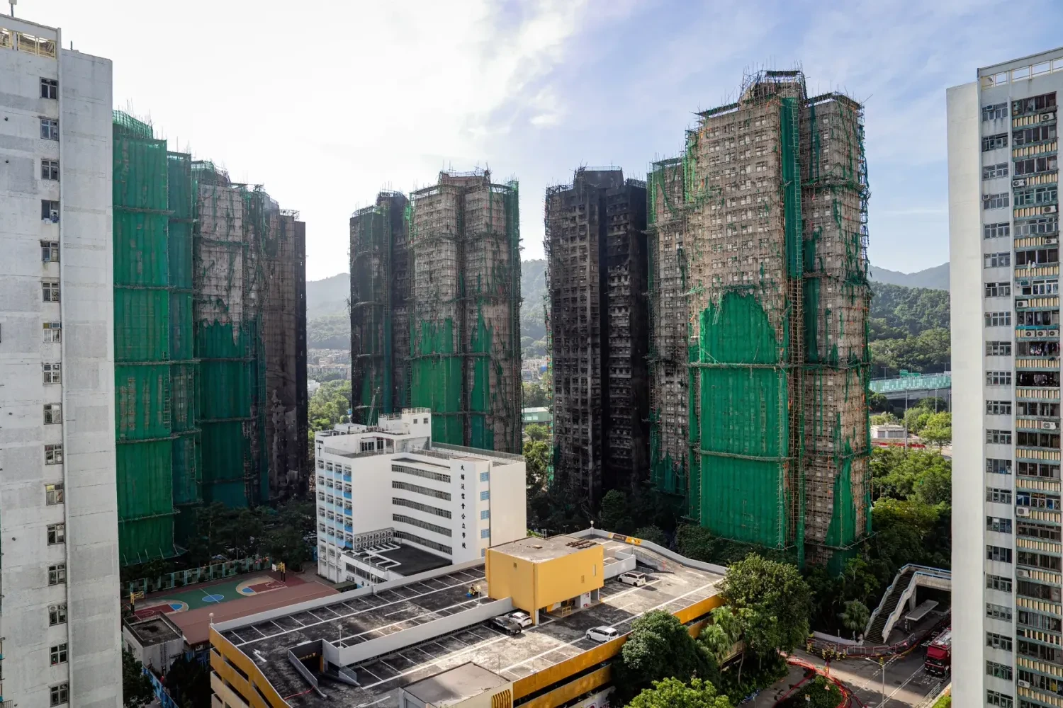 Hong Kong urgently removes all external scaffolding after a massive fire that killed over 150 people
