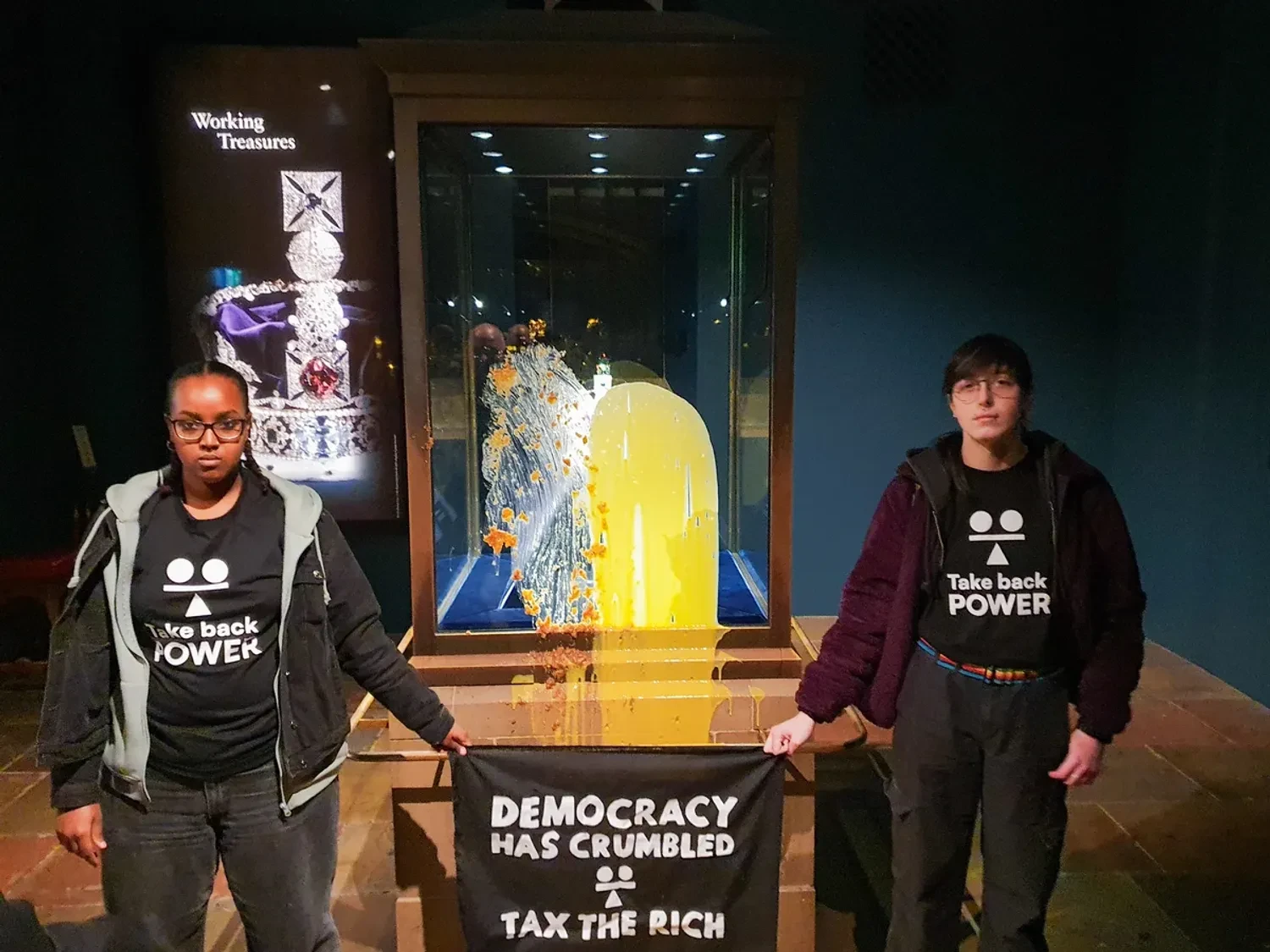 Activists threw food at the display case with the Crown Jewels in the Tower of London