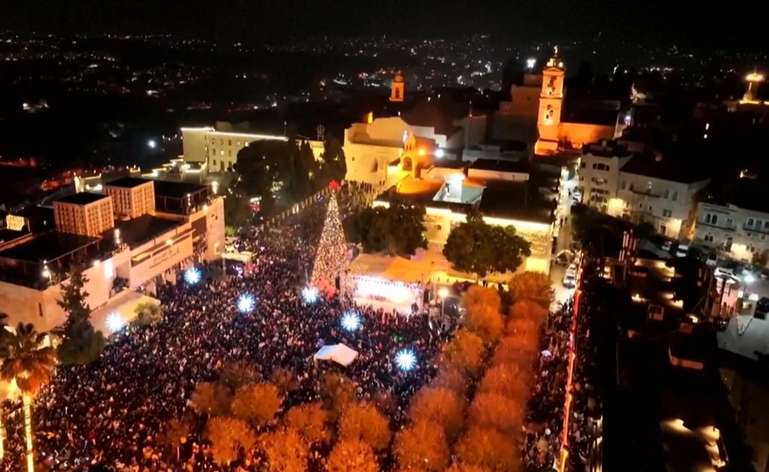 Christmas tree in Bethlehem lit for the first time since the start of the war in Gaza