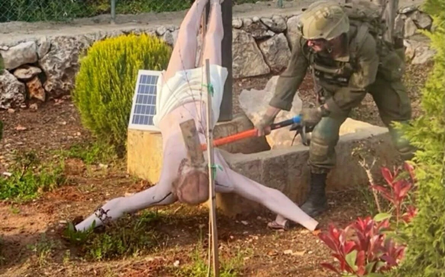 IDF confirmed the authenticity of the photo with a soldier smashing a statue of Jesus in Lebanon and promised punishment