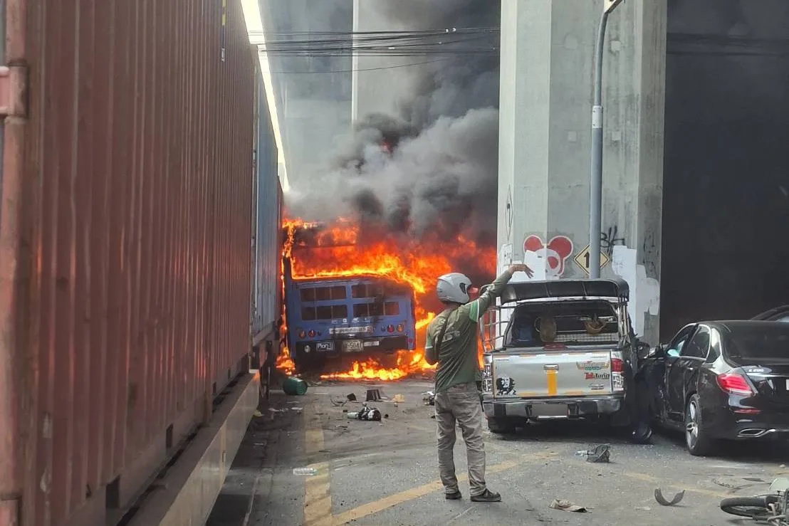 Train collides with bus in Bangkok, leaving dead and dozens injured