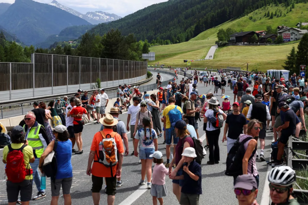 In Austria, thousands of people blocked a key Alpine highway for eight hours
