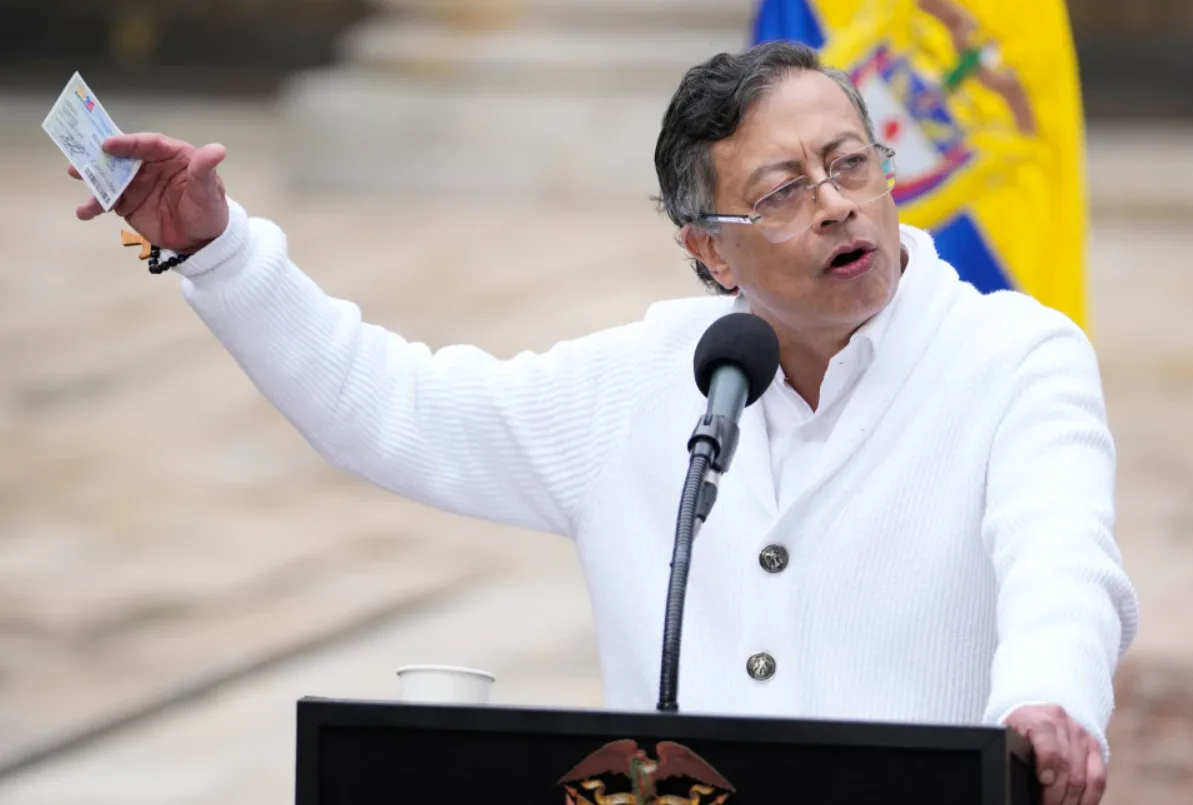 Nearly 100 Colombian guerrillas have laid down their weapons as part of the peace process