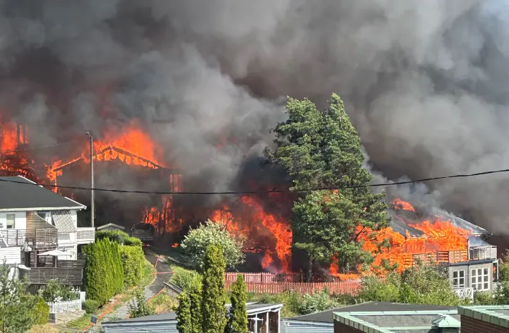 A massive fire in Norway has destroyed over 100 homes and continues to spread