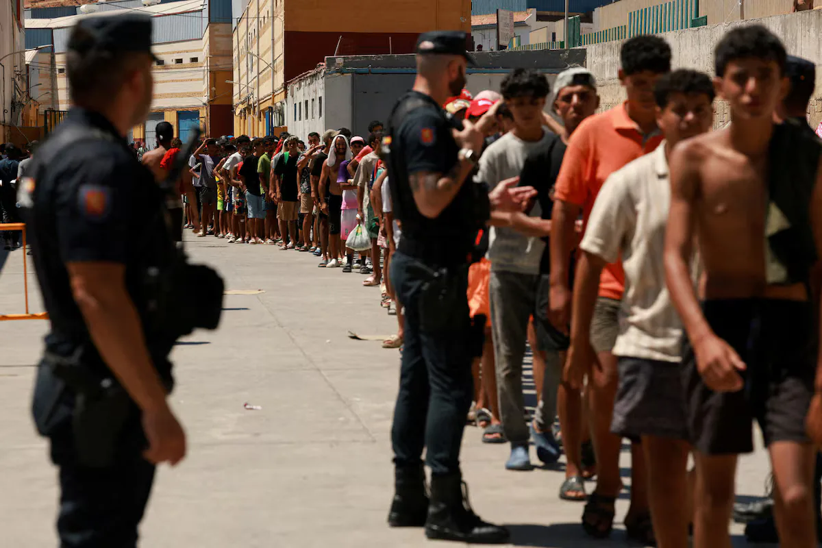 The first migrants were buried in the Spanish enclave of Ceuta after a deadly crush at the border