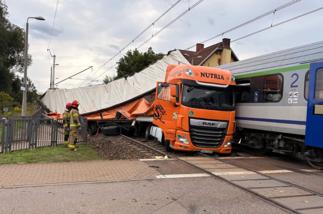 In Poland, a train carrying hundreds of passengers crashed into a truck that was stuck at a railway crossing